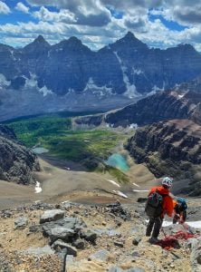 Mount Temple: Person climbing down overlooking Valley of Ten Peaks